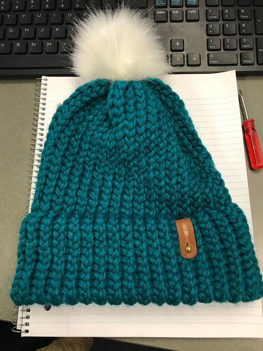 BLUE HAT, WHITE POMPOM WITH ANXIOUSLOOMERS TAG