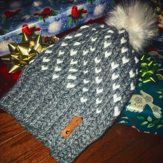 SILVER HAT WITH WHITE HEARTS, WHITE POMPOM WITH ANXIOUSLOOMERS TAG