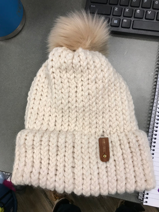 CREAM HAT. TAN POMPOM WITH ANXIOUSLOOMER TAG