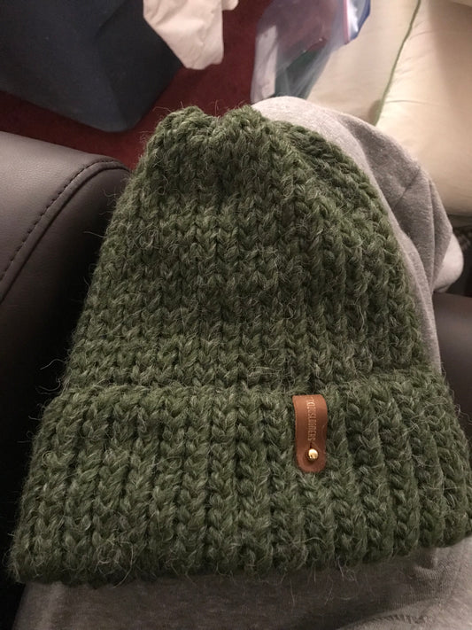 GREEN HAT WITH ANXIOUSLOOMERS TAG
