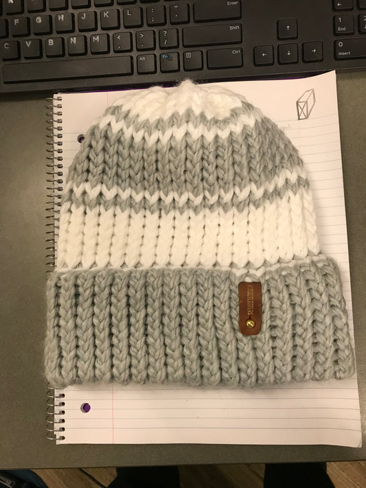 SILVER AND WHITE HAT WITH ANXIOUSLOOMERS TAG