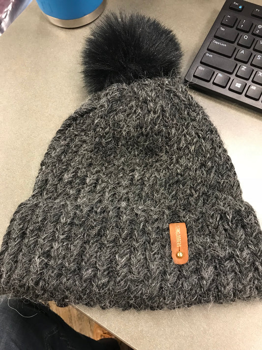 GREY HAT, BLACK POMPOM WITH ANXIOUSLOOMERS TAG