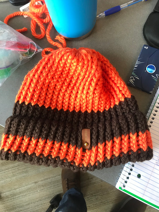 ORANGE AND BROWN HAT WITH ANXIOUSLOOMER TAG