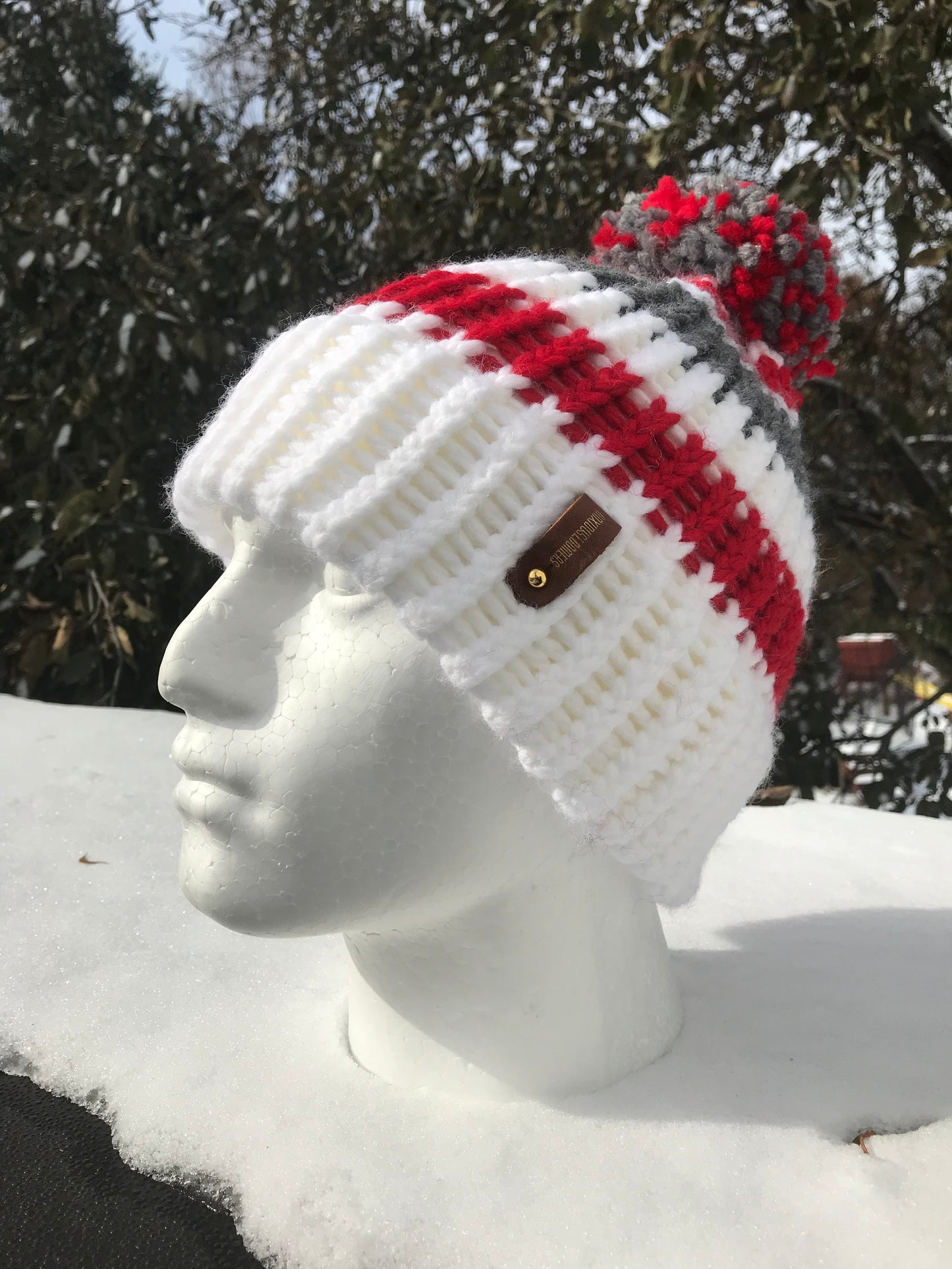 RED, WHITE AND SILVER HAT WITH ANXIOUSLOOMERS TAG