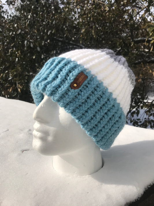BLUE, WHITE AND SILVER HAT WITH ANXIOUSLOOMER TAG