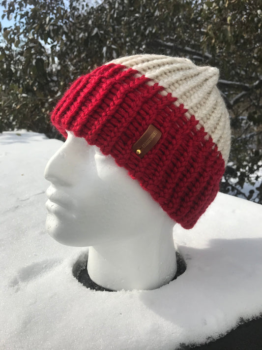 RED AND CREAM HAT WITH ANXIOUSLOOMER TAG