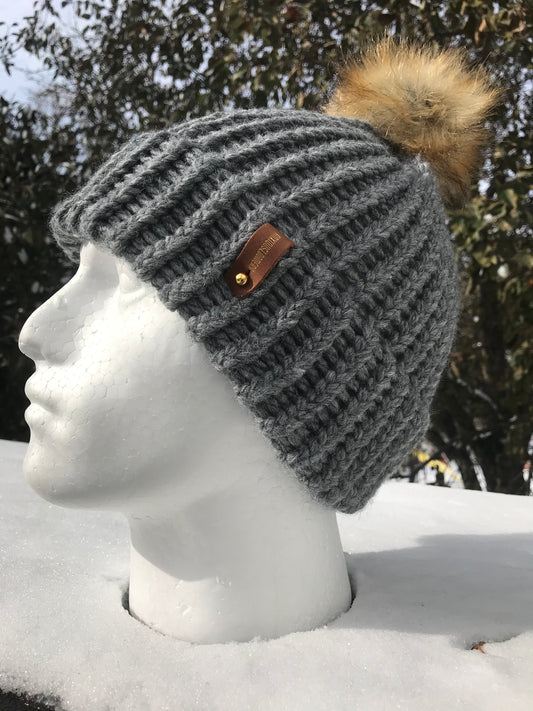 SILVER HAT, TAN POMPOM WITH ANXIOUSLOOMERS TAG