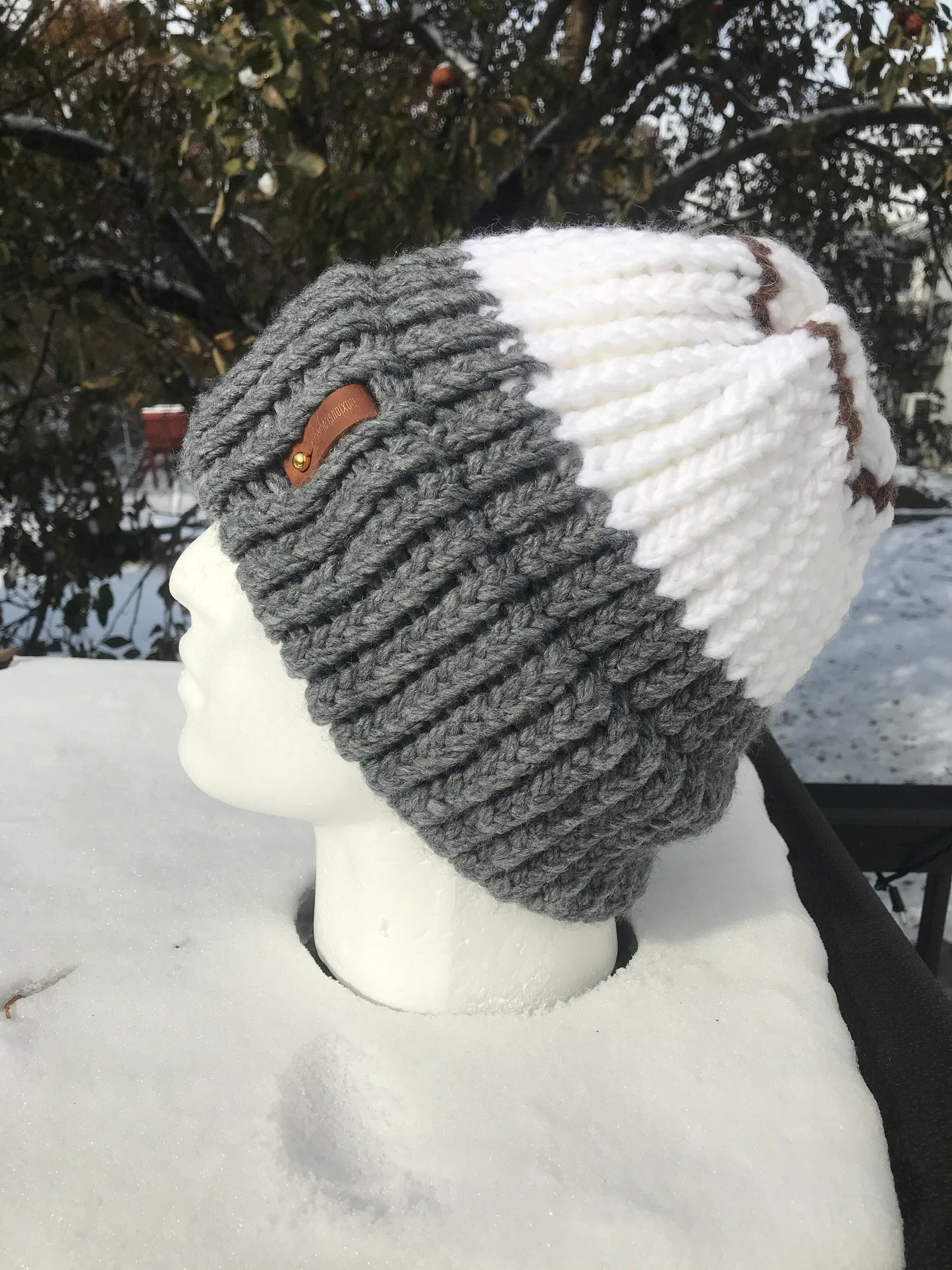SILVER, WHITE, BROWN HAT WITH ANXIOUSLOOMERS TAG