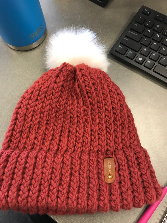 RED HAT, WHITE POMPOM WITH ANXIOUSLOOMERS TAG