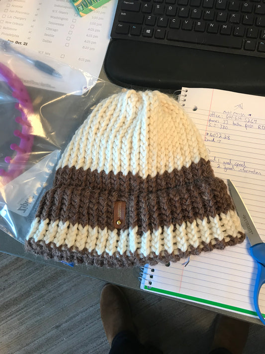 CREAM AND BROWN HAT WITH ANXIOUSLOOMER TAG