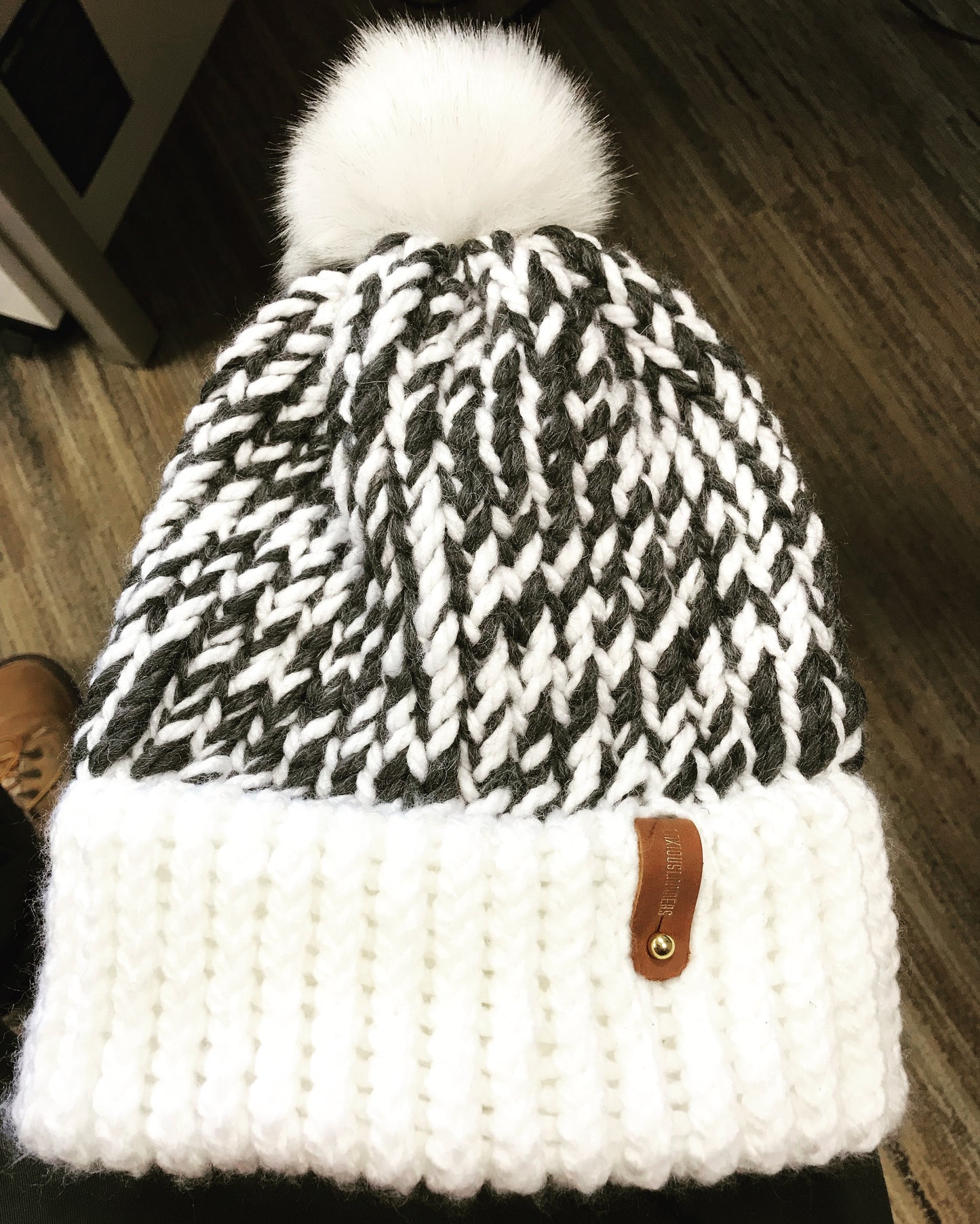 ZEBRA STYLE HAT, WHITE POMPOM WITH ANXIOUSLOOMERS TAG